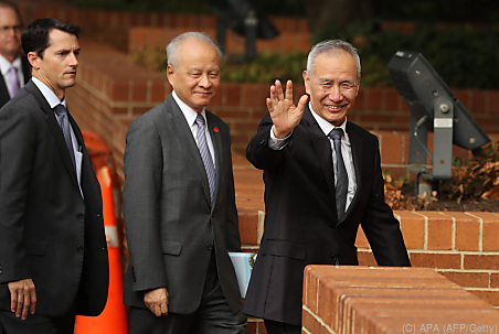 Chinas Vize-Premierminister Liu He (rechts) ist optimistisch